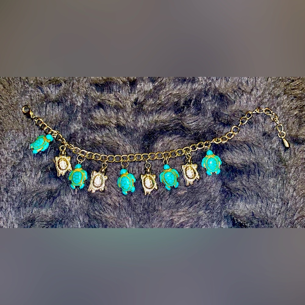 Silver Bracelet with silver and blue turtle charms